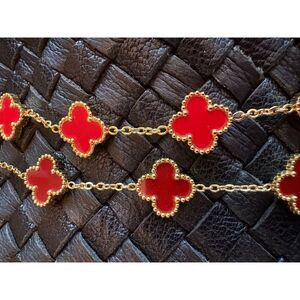 CLOVER FASHION BRACELETS - NWOT Set of 2 – one bright red and one dark red. NWOT
